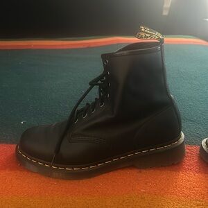 Means size 10 boots, black leather.